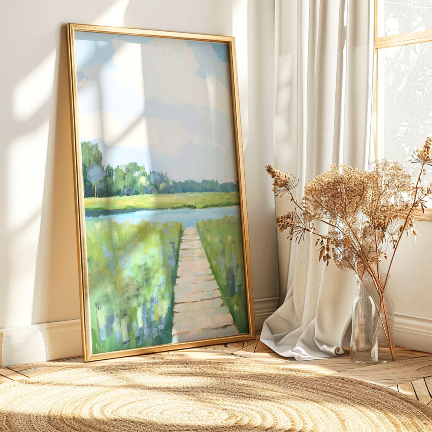 May include: A framed landscape painting with a gold frame. The artwork depicts a serene scene of a wooden pier leading to a body of water, surrounded by green grass and trees. The sky is a soft blue with hints of clouds.